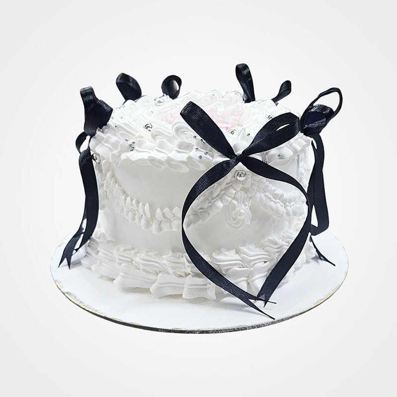 white and black Coquette Cake white and black Coquette Cake